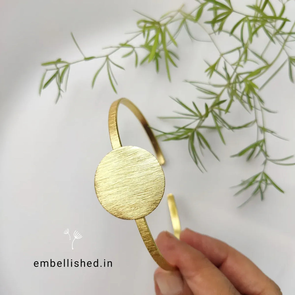 Brush textured round center open cuff bracelet