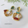Raw stones mismatched earrings