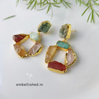 Raw stones mismatched earrings