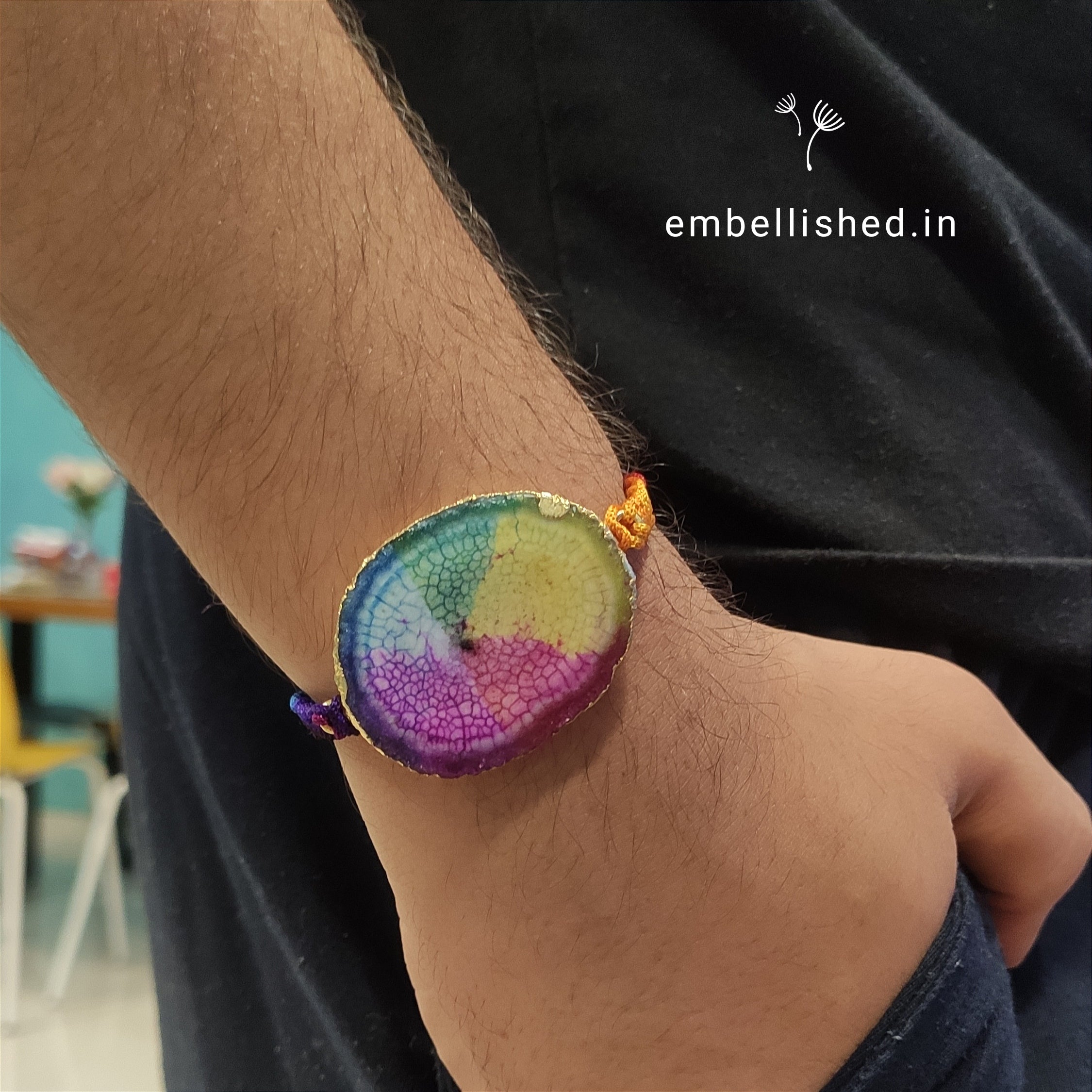 Solar Agate Slice Rakhi with Handwoven Rainbow Cord