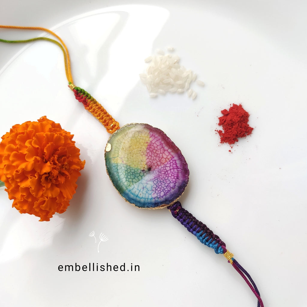 Solar Agate Slice Rakhi with Handwoven Rainbow Cord