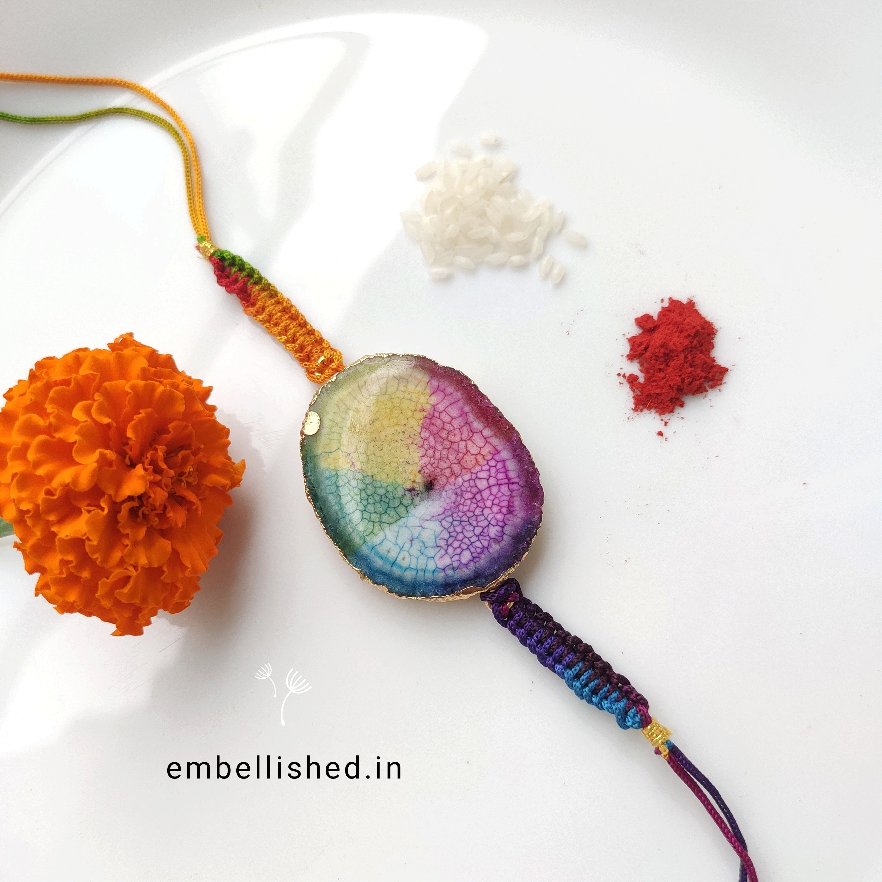 Solar Agate Slice Rakhi with Handwoven Rainbow Cord