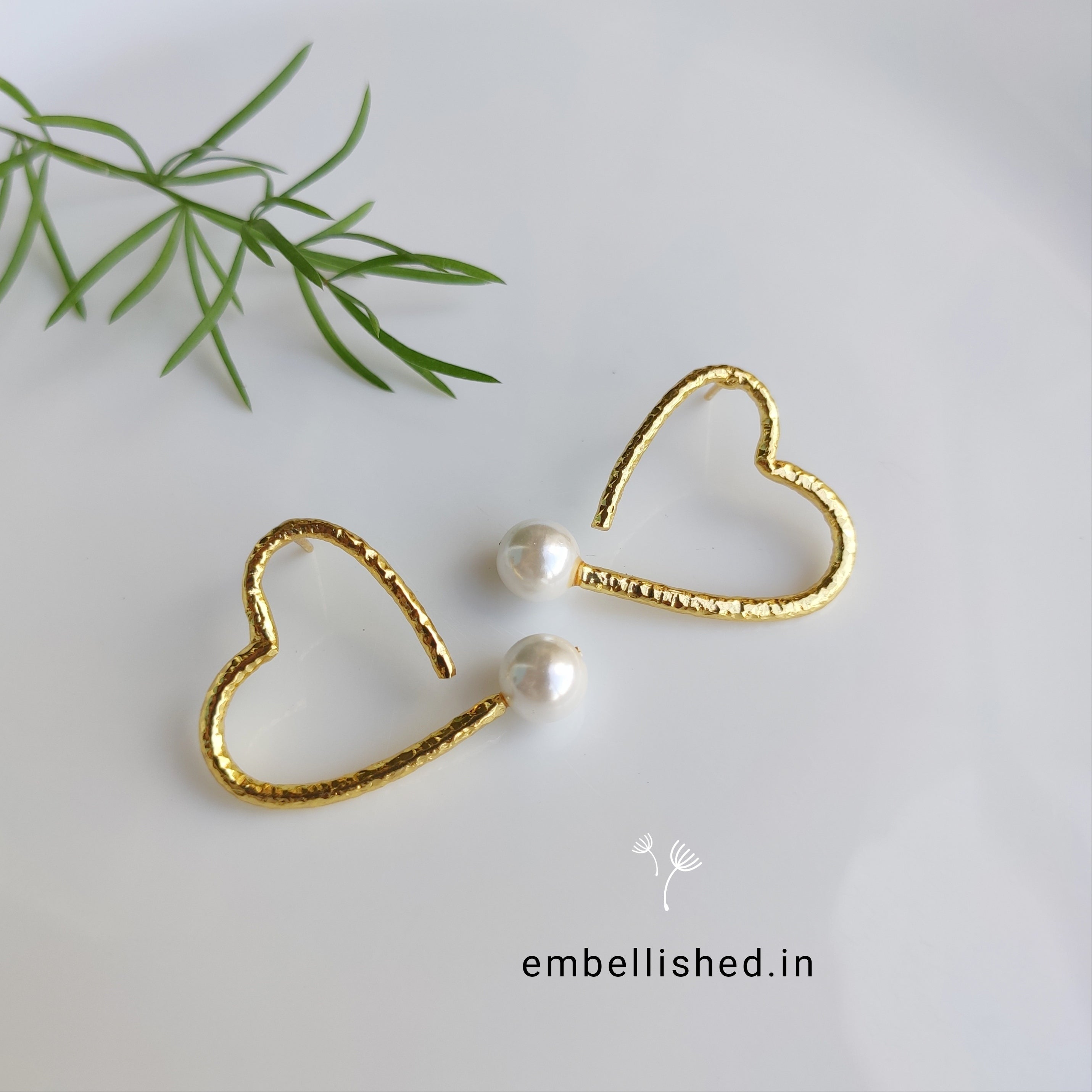 Pearl on heart earrings