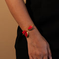 Three stones medley open bangle - coral