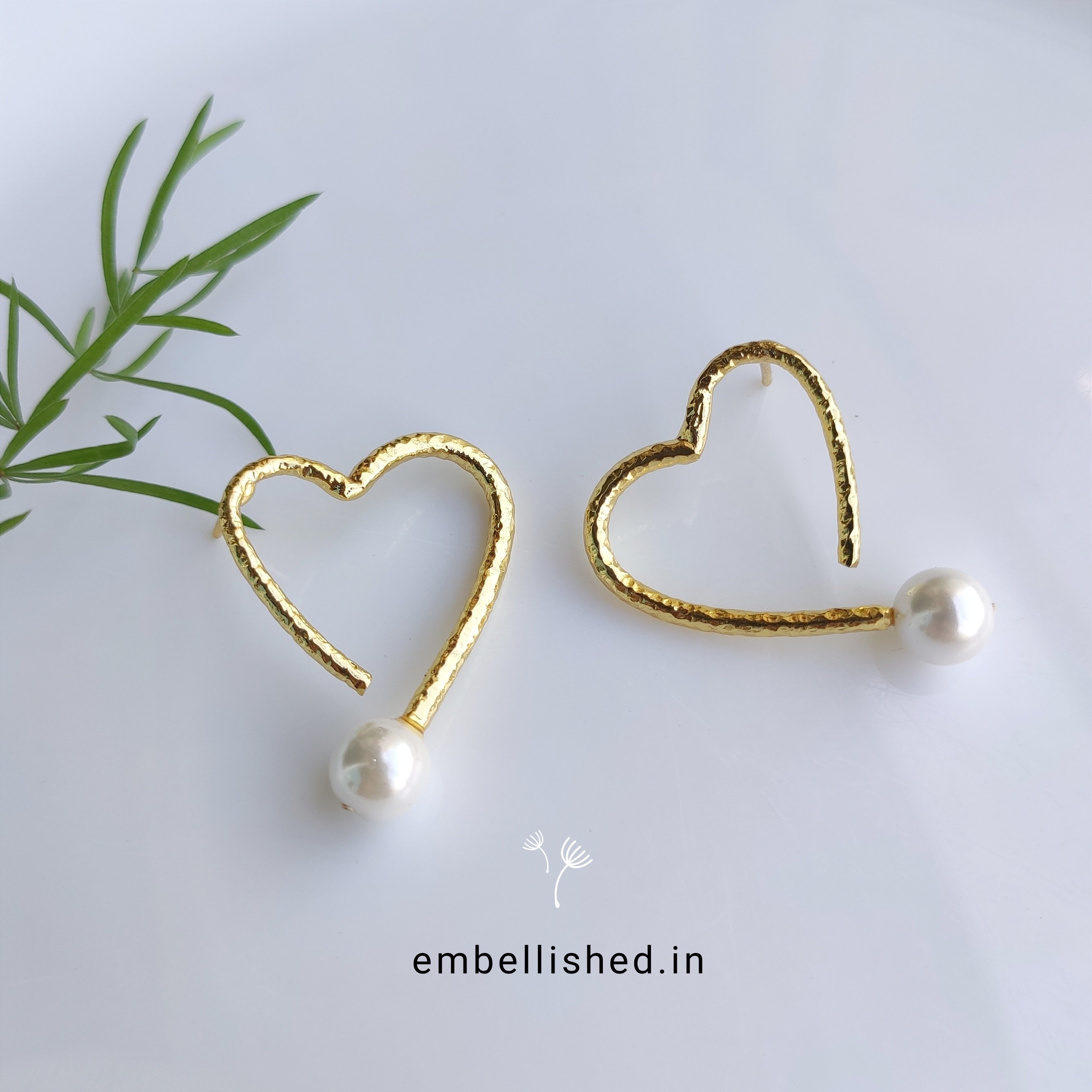 Pearl on heart earrings