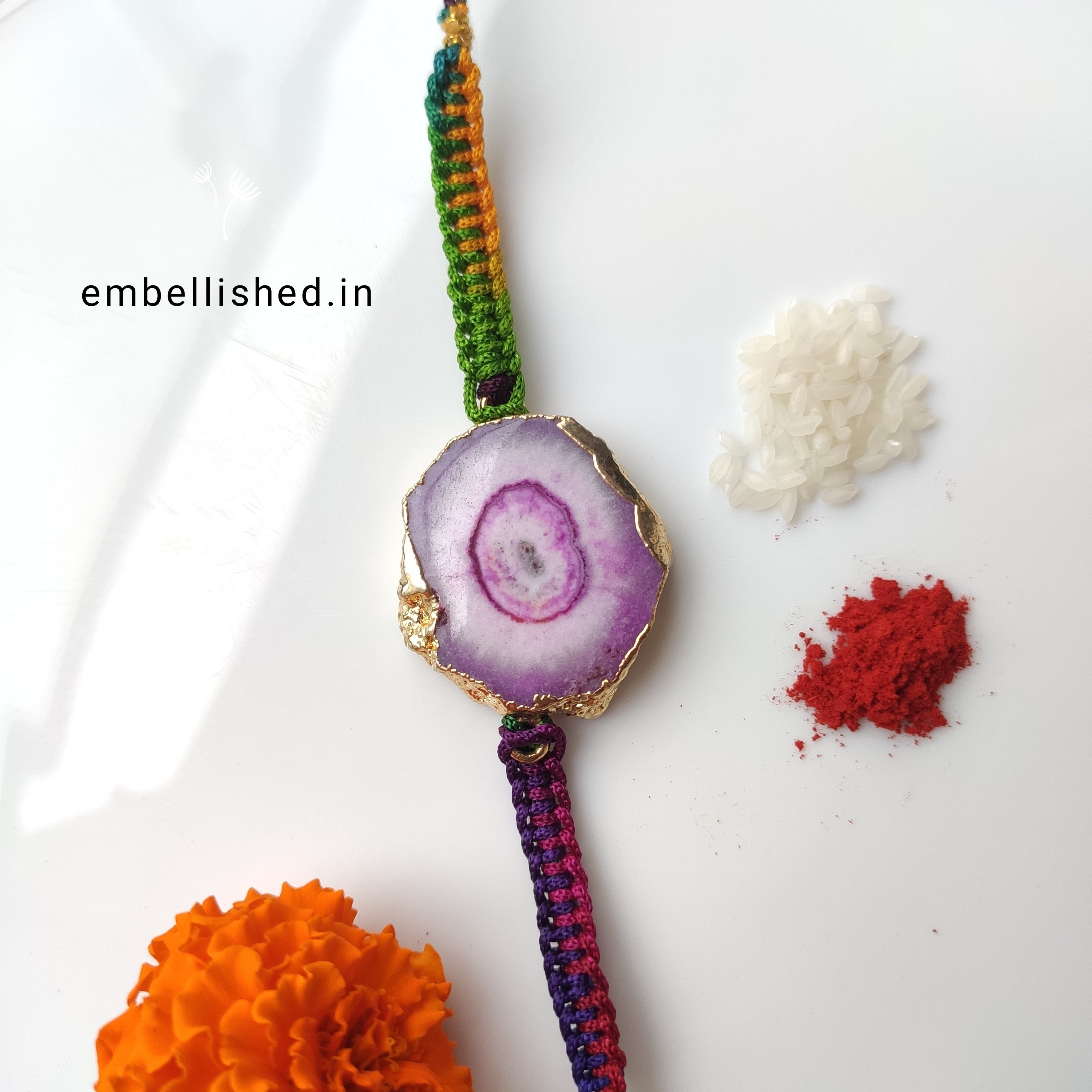 Solar Agate Slice Rakhi with Handwoven Rainbow Cord