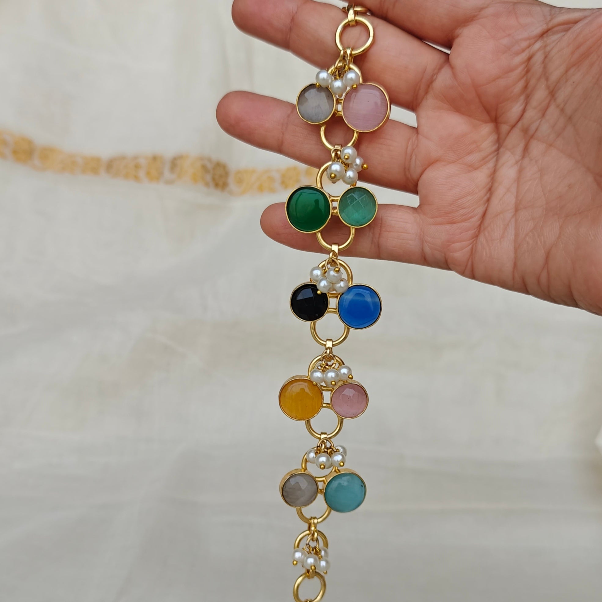Kaleidoscope stones and pearl accents bracelet