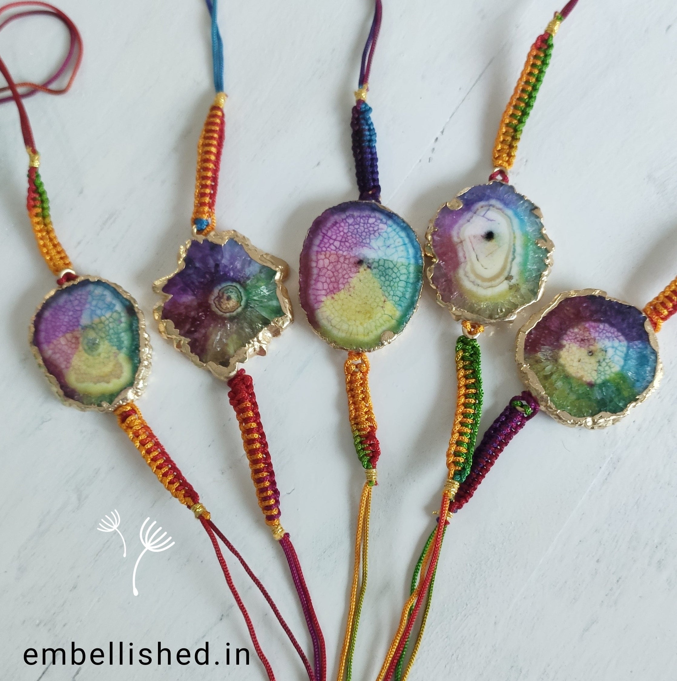 Solar Agate Slice Rakhi with Handwoven Rainbow Cord