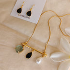 Bar pendant chain set with assorted stones
