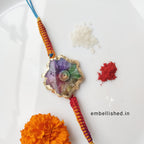 Solar Agate Slice Rakhi with Handwoven Rainbow Cord
