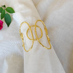 Golden Orbit Statement Cuff