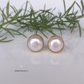 Fresh water pearl studs