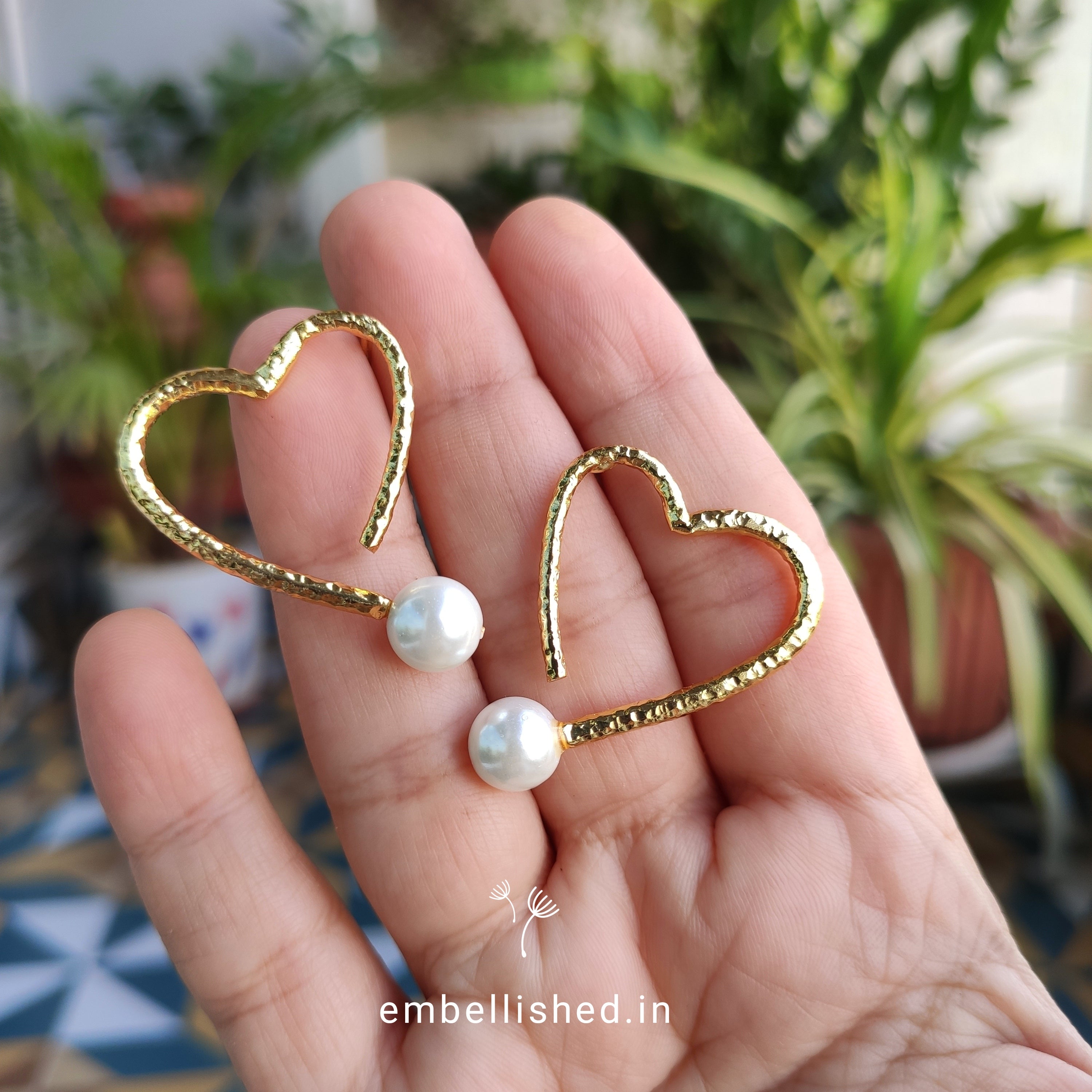 Pearl on heart earrings