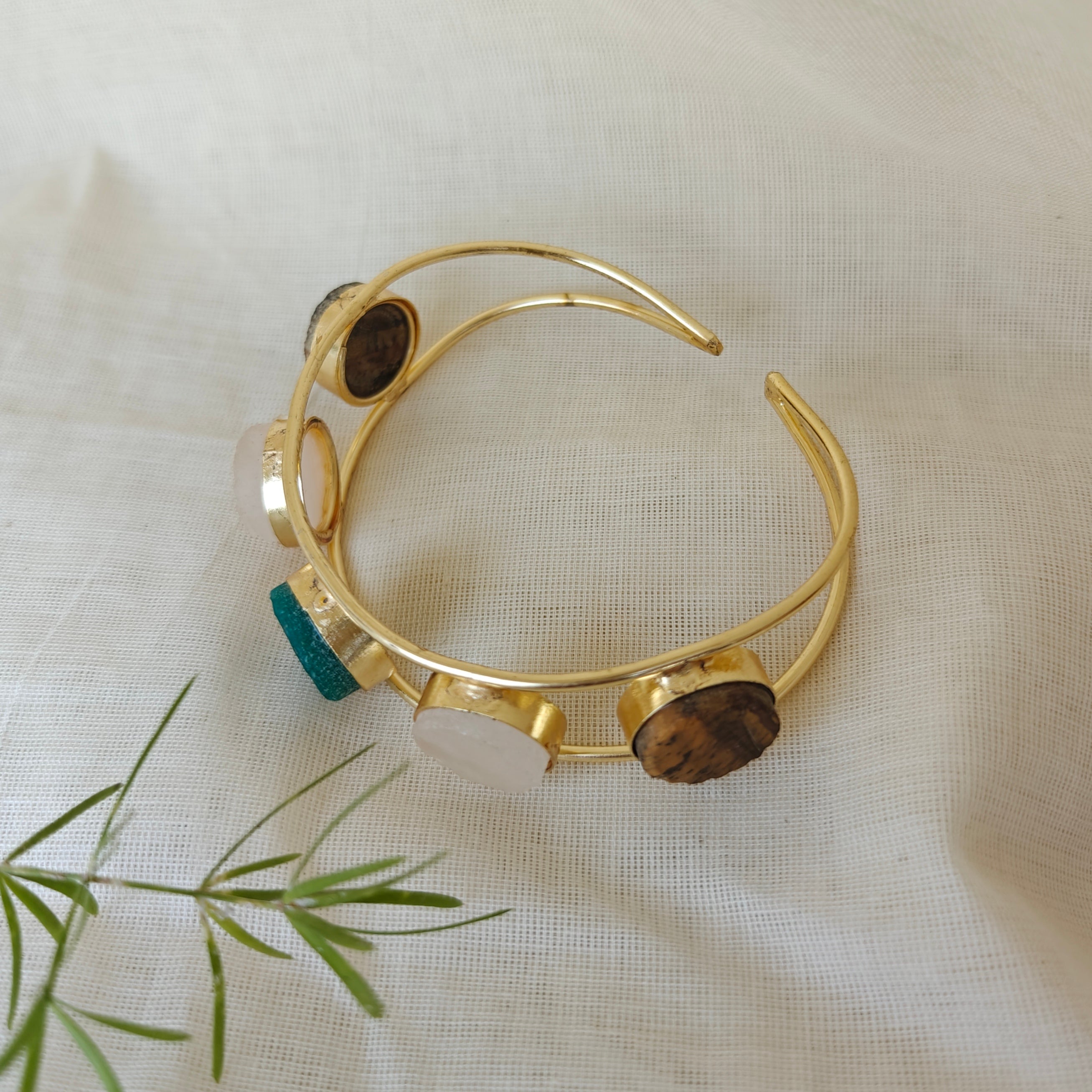 Multi-stone round cuff bracelet