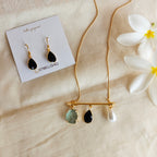 Bar pendant chain set with assorted stones