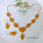 Gold-plated carved glass stone necklace set - amber
